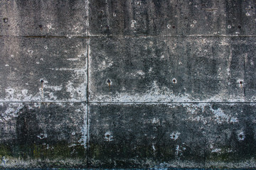 染みのある古いコンクリートの壁