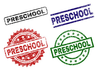 PRESCHOOL seal prints with corroded style. Black, green,red,blue vector rubber prints of PRESCHOOL label with unclean style. Rubber seals with circle, rectangle, medal shapes.