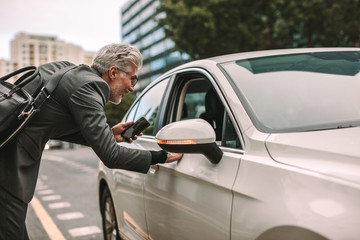 Man taking cab for traveling