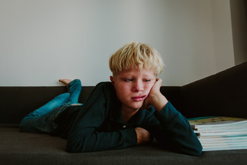 Obraz premium little boy cry tired of doing homework, overload, stress