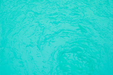 Surface of blue swimming pool, background of water in swimming pool.