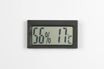 electronic humidity meter and temperature on white background