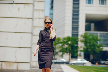 businesswoman in a summer city