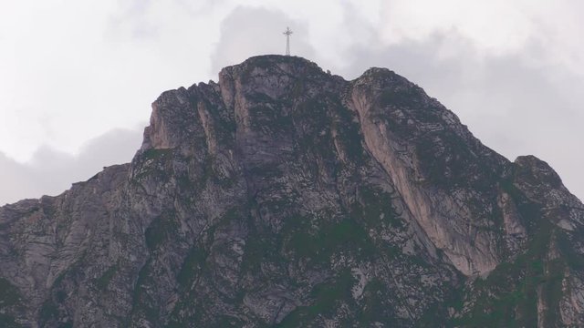 Poland,Zakopane, View of the highlander hut. In the background of mountains TATRY, Clouds. Trees and meadows. Sleeping knight and cross at Giewont. Sunrise. Panning camera, Pan, Closeup