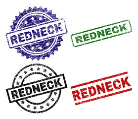 REDNECK seal prints with damaged texture. Black, green,red,blue vector rubber prints of REDNECK title with scratched surface. Rubber seals with circle, rectangle, medal shapes.
