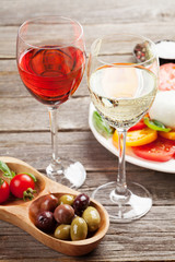 White and rose wine with caprese salad