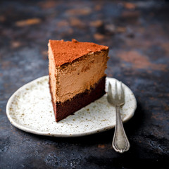 Chocolate Cake on a dark background. Homemade baking.