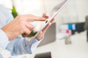 Businessman using a tablet