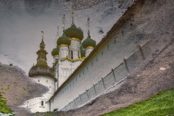 Reflection in a September pool of a fragment of the Rostov Kremlin