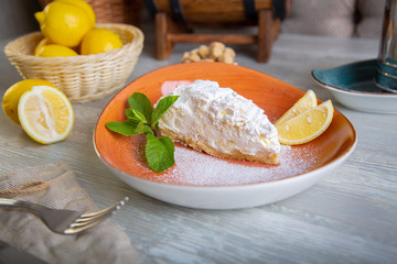 Close up view of beautiful elegant sweet dessert served on the plate. Beautiful decoration, restaurant dish, ready to eat. Tea time, cozy atmosphere.