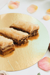 Baklava sweet dessert. Pastry made of layers of filo filled with chopped nuts and sweetened and...