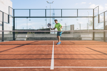 Obraz premium Sportsman playing padel game
