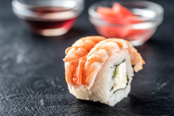 Sushi rolls of fresh shrimps rice and Philadelphia cheese