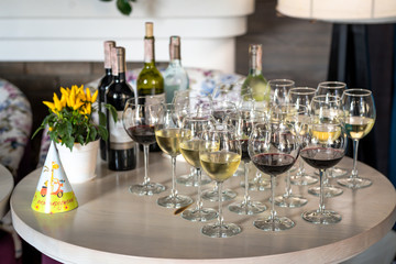 Festive table with glasses of wine