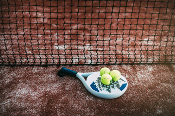 Padel blade racket on the floor