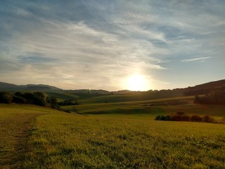 Obraz premium Sunrise and sunset over the hills and town. Slovakia 