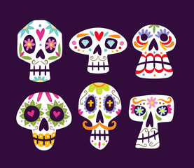 Fototapeta premium Colorful mexican skull collection. Cute cartoon sugar skulls isolated on purple background. Set 1 of 2. Vector illustration.