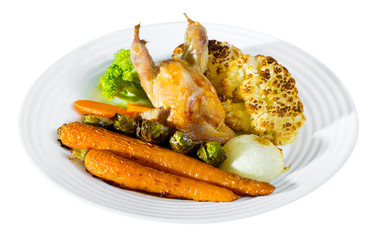 Broiled quail with baked vegetables