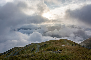 Above a sea of clouds during sunrise in the mountains