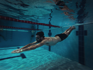 Swimmer in the Pool Underwater
