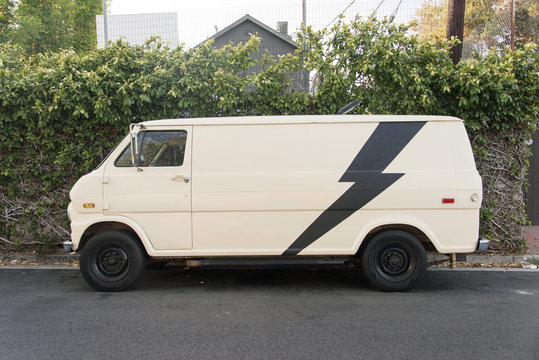 Side View Of A Vintage Classic Van Car In The Street