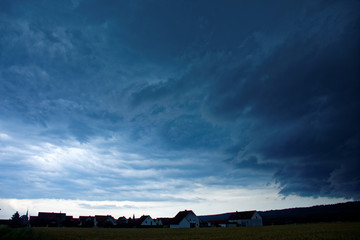 the stormy sky over the village