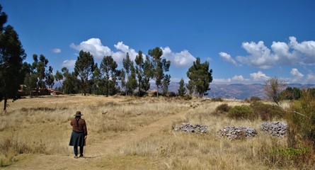 Woman on countryside in area of Saqsaywaman