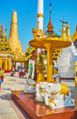 Religious statues in Shwedagon Zedi Daw, Yangon, Myanmar