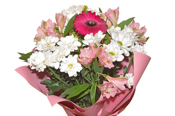Bouquet of chrysanthemums and gerberas in pink paper isolated on white background