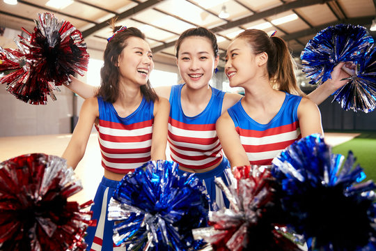 Young female cheerleading