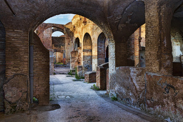Fototapeta na wymiar Inside view of the seven wise men tenement spa in the ancient Roman ruins of Ostia Antica - Rome