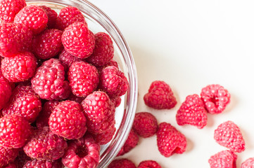 Farm organic raspberry for smoothie on the light background.