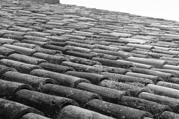 Tiles detail of an old italian roof - Architectural background (Marche, Italy, Europe)
