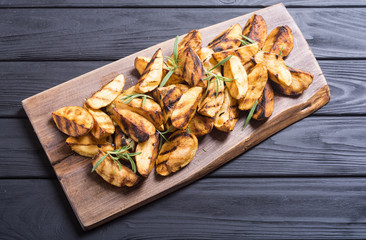 Homemade grilled potatoes with rosemary