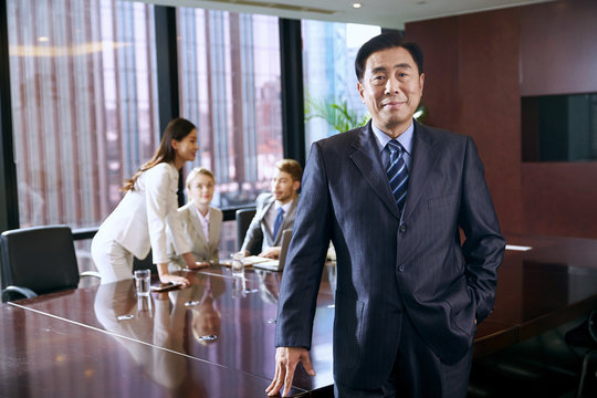 Business men and women in the conference room