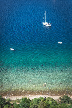 Sail boat with coast