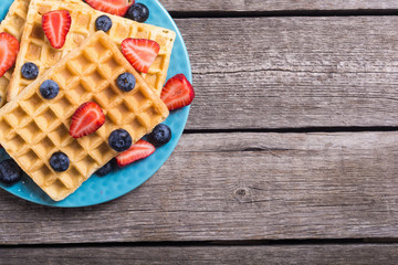 Belgian waffles with strawberry and blueberry