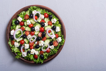 Obraz na płótnie Canvas Fresh vegetables greek salad
