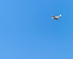 airplane against blue sky