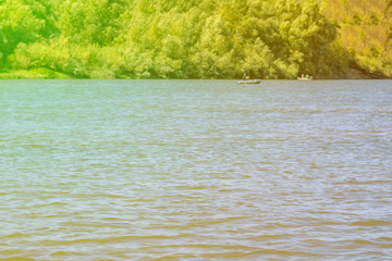 inflatable small fishing boat on the river on a summer season day f