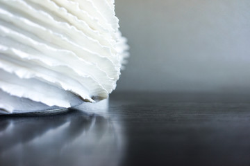 beautiful white vase on a wooden table