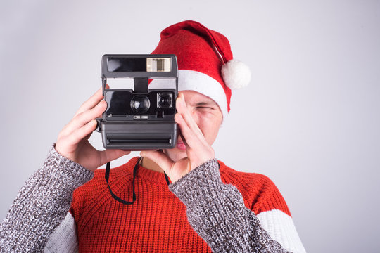 Santa-claus taking picture with his old camera