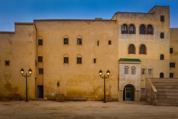 Fototapeta na wymiar Arabic building in Rcif square, Fez, Morocco