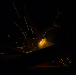 Flash and sparks from electric welding
