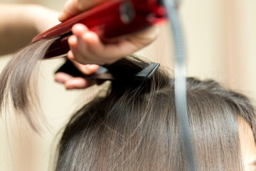 wrap hair curling in a beauty salon
