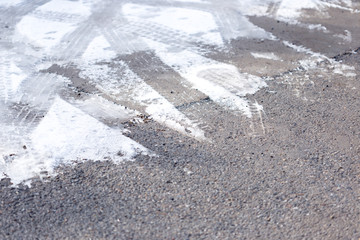 traces of the car wheels on snow