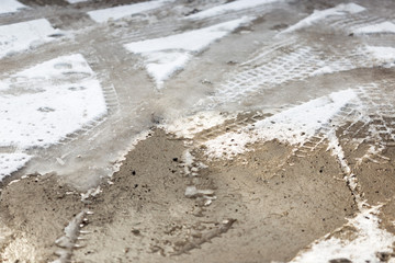 traces of the car wheels on snow