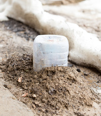 flower closed plastic bottles so as not to freeze in the winter