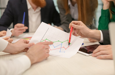 Employees having meeting in office. Financial trading concept