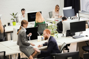 Young people working in modern office
